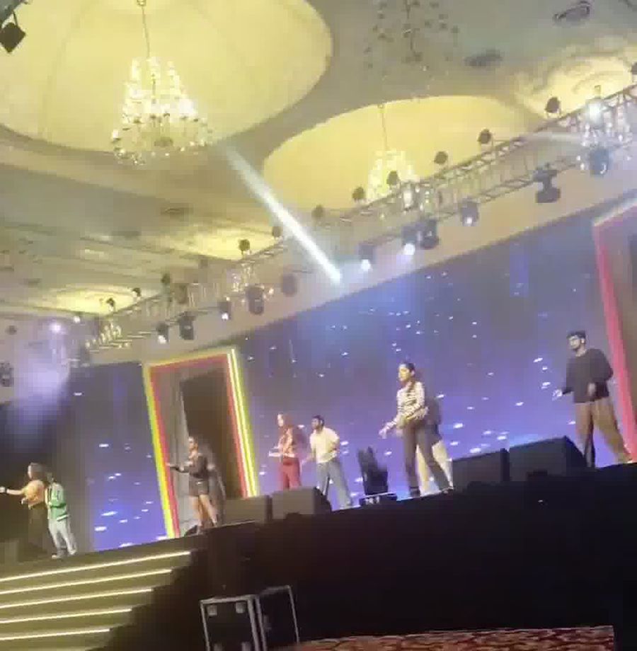 Live performance on stage at a team I event